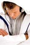 Young Guy Listening To Music With Headphones Stock Photo