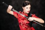 Woman Holding Katana Weapon Stock Photo