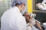 Man Having His Teeth Examined Stock Photo