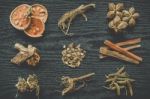 Dried Herbs And Ginseng, Top View Of Thai Herbs And Ginseng On Wooden Floor Stock Photo