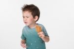 Boy Dislike Fried Chicken Stock Photo