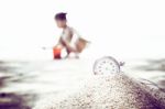 Vintage Pocket Watch On Sand Stock Photo