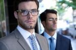 Two Young Executives Arriving At The Hotel Stock Photo