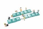 Miniature Worker Team Building Word Happy New Year On White Back Stock Photo