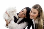 Young Friends holding Cat Stock Photo