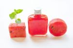 Bottle Of Fresh Watermelon Juice With  Watermelon Pieces Stock Photo