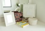 Picture Frame And Book On A Dresser In A Bedroom Stock Photo