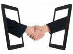 Handshaking Business People Stock Photo