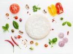 The Ingredients For Homemade Pizza On White Wooden Background Stock Photo