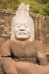 Statue Of Ancient Khmer Warrior Head At Angkor Wat Stock Photo