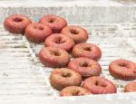 Fresh Made Red Velvet Cake Donuts Stock Photo