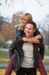 Young Couple In Park Stock Photo