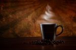 Cup Of Hot Coffee On Vintage Background Stock Photo