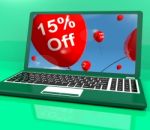 Balloons On Computer Showing Sale Discount Of Fifteen Percent On Stock Photo