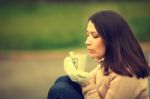 Dreaming Girl With Cup Of Coffee Stock Photo