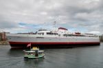 One Of The Many Victoria Habour Ferries Pottering Along In Vict Stock Photo