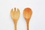 Wooden Spoon And Fork On White Background Stock Photo