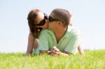 Kissing Young Couple Stock Photo