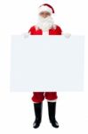 Saint Nicholas Standing Behind Blank Whiteboard Stock Photo