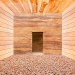 Stone Wall With Door And Stone Floor In Wooden Room Stock Photo