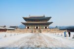 Seoul, South Korea - January 19: Tourists Taking Photos Of The Beautiful Scenery Around Gyeongbokgung Palace On January 19, 2015 In Seoul, South Korea Stock Photo