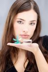 Woman Holding Contact Lenses Wash Container Stock Photo