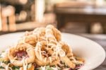 Deep Fried Calamari Rings And Salad Stock Photo