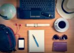 Office Desk With Computer, Supplies, Coffee Cup And Personal Ite Stock Photo