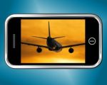 Airplane Flying On Mobile Phone Stock Photo