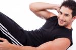 Man Doing Abdomen Exercise Stock Photo