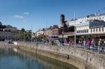 Torquay, Devon/uk - July 28 : People Enjoying The Sunshine  In T Stock Photo