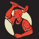 Worker With Hammer Striking Retro Stock Photo