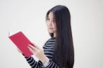 Portrait Of Thai Teen Beautiful Girl Reading Book Stock Photo