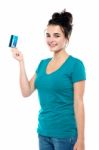 Young Lady Holding Credit Card Stock Photo