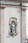 Statue On The Wall Of Ss Philip And Jacob Parish Church In Corti Stock Photo