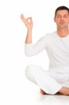 Man Is Practicing Yoga Stock Photo