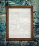 Vintage Picture Frame On Collage Rotten Jeans Stock Photo