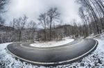 S Curve Road In The Mountains After Winter Snow Storm Stock Photo