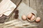 Egg, Chicken Egg In Wood Bowl, Top View Stock Photo