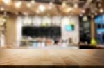 Selected Focus Empty Brown Wooden Table And Coffee Shop Or Resta Stock Photo