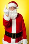 Angry Santa Showing Middle Finger Stock Photo