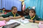 Activity Of Teaching Elementary Students. Elementary Students Are Test Lesson. The Students Intend Exam Stock Photo