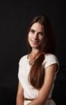 Portrait Of A Beautiful Young Smiling Girl In A Bright Dress Stock Photo