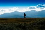 Shadow Of Lonely Traveller In Norway Background Stock Photo