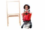 Pretty Child Posing With Basket Stock Photo