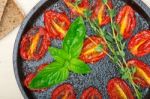 Baked Cherry Tomatoes With Basil And Thyme Stock Photo