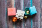 Gifts On A Wooden Floor Stock Photo