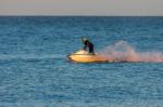 Dungeness, Kent/uk - December 17 ; Man Riding A Jet Ski Off Dung Stock Photo