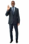 Businessman  Showing Okay Sign Stock Photo