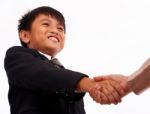 Boy Shaking Hands Stock Photo